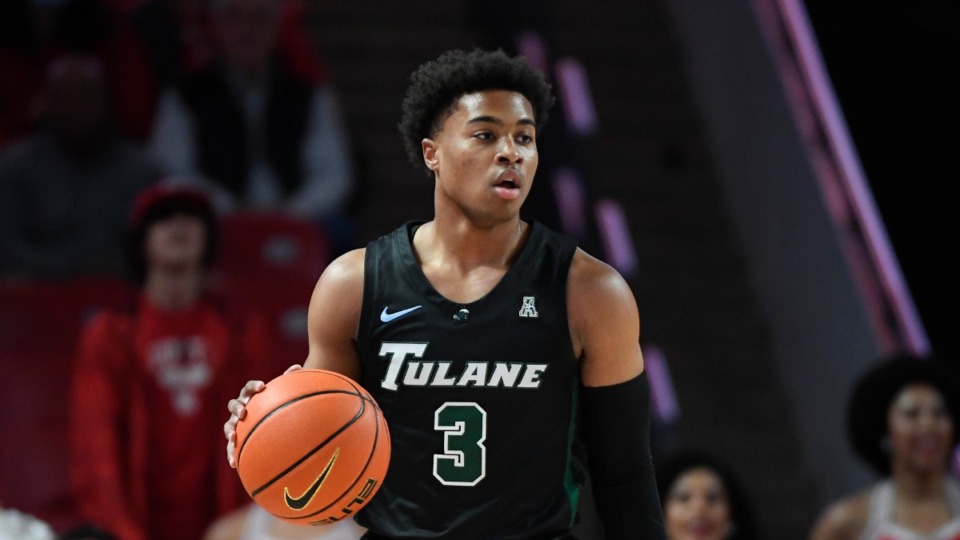 <strong>Tulane guard Jalen Cook (3) brings the ball up court against Houston during the first half of an NCAA college basketball game Feb. 2, 2022, in Houston.</strong> (Justin Rex/AP file)