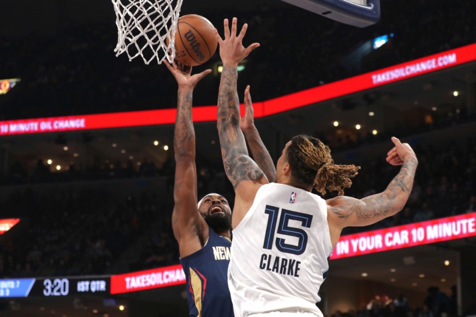 <strong>New Orleans Pelicans forward Naji Marshall (8) shoots while defended by Memphis Grizzlies forward Brandon Clarke (15) during the first half of an NBA basketball game Saturday, Dec. 31, 2022, at FedExForum.</strong> (Nikki Boertman/AP)