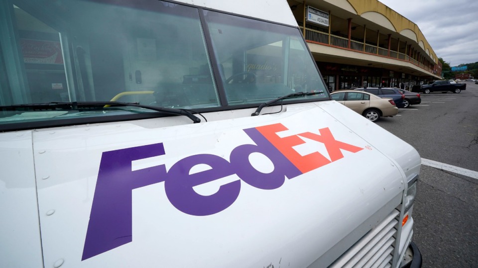 <strong>A FedEx truck makes deliveries at a store in Mount Lebanon, Pennsylvania on Thursday, Sept. 29, 2022.</strong> (AP Photo/Gene J. Puskar, File)