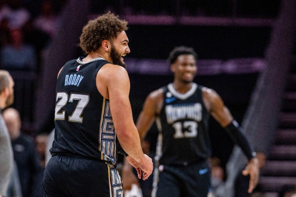 <strong>Memphis Grizzlies forward David Roddy (27) laughs as he heads off for a timeout in the game against the Charlotte Hornets on Wednesday, Jan. 4, 2023, in Charlotte, N.C.</strong> (Scott Kinser/AP)