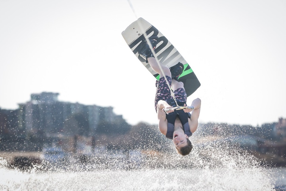 <strong>Corey Piskorski does a flip while wake boarding at the 46th annual Ski Freeze at the Mud Island River Park in Downtown Memphis Jan. 1, 2023.</strong> (Patrick Lantrip/The Daily Memphian)