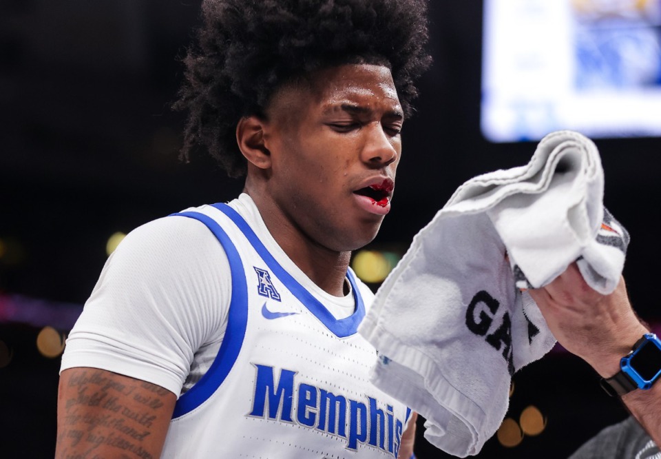 <strong>Memphis guard Kendric Davis (3) gets treated for a bloody lip during a Jan. 7, 2023 game against ECU.</strong> (Patrick Lantrip/The Daily Memphian)