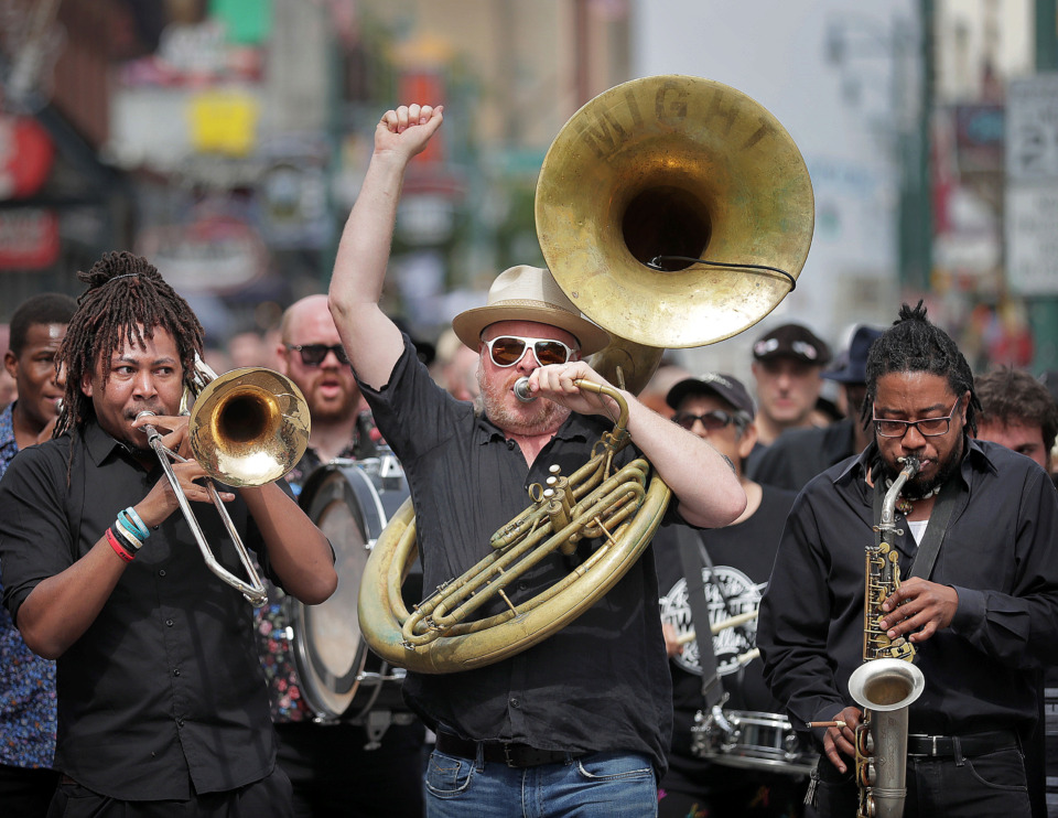 <strong>Local musicians, fans, friends and family gather for a Beale Street funeral procession to honor musician Omar Higgins, who was leader of the reggae band Chinese Connection Dub Embassy and hardcore punk band Negro Terror. </strong>(Jim Weber/Daily Memphian)