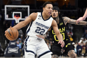 <strong>Memphis Grizzlies guard Desmond Bane (22) handles the ball against Utah Jazz guard Jordan Clarkson at FedExForum Sunday, Jan. 8</strong>. <strong>Clarkson commited a flagrant foul against Bane and was ejected.</strong> (Brandon Dill/AP Photo)