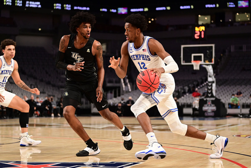 <strong>Deandre Williams (12) in University of Memphis Tigers against University of Central Florida on March 12, 2021.</strong> (Courtesy Ben Solomon/American Athletic Conference file)