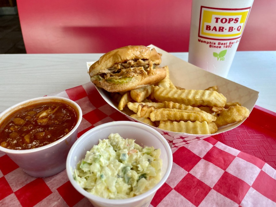 <strong>The Tops Bar-B-Q chicken sandwich is served in white sauce with tangy pickles. A combo, with the sandwich, a drink and two sides, is a $10 Deal.</strong> (Jennifer Biggs/The Daily Memphian)