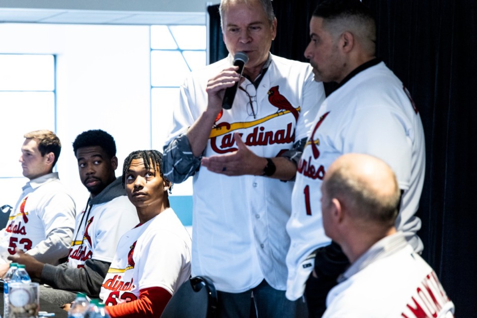 <strong>Jordan Walker (seated, second from left) and Tink Hence watch as Ricky Horton (standing, center) interviews Bengie Molina during the annual Cardinals Caravan visit to AutoZone Park on Friday, Jan. 13, 2023.</strong> (Brad Vest/Special to The Daily Memphian)