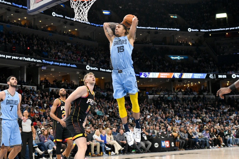 <strong>Memphis Grizzlies forward Brandon Clarke (15) goes up for a dunk ahead of Phoenix Suns center Jock Landale (11) in the second half of an NBA basketball game Monday, Jan. 16, 2023, in Memphis.</strong> (AP Photo/Brandon Dill)