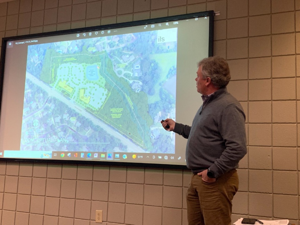 <strong>Cory Brady, principal with Integrated Land Solutions, shows concepts of medical office buildings on Poplar. He held a neighborhood meeting Thursday to hear concerns. </strong>(Abigail Warren/The Daily Memphian)
