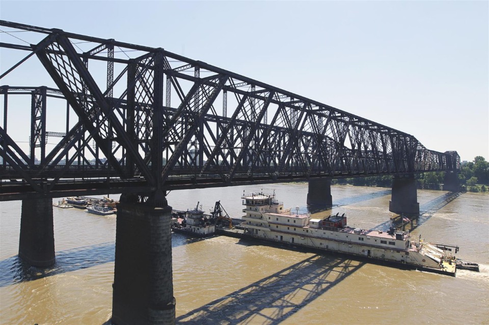 <strong>An Army Corps of Engineers vessel passes under the Harahan and Frisco bridges.</strong> (Daily Memphian file)