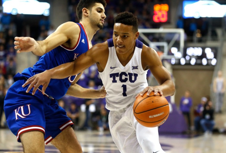 <strong>TCU guard Desmond Bane (1) drives against Kansas guard Sam Cunliffe (3) during the second half of an NCAA college basketball game Saturday, Jan. 6, 2018, in Fort Worth, Texas.</strong> (Ron Jenkins/AP file)