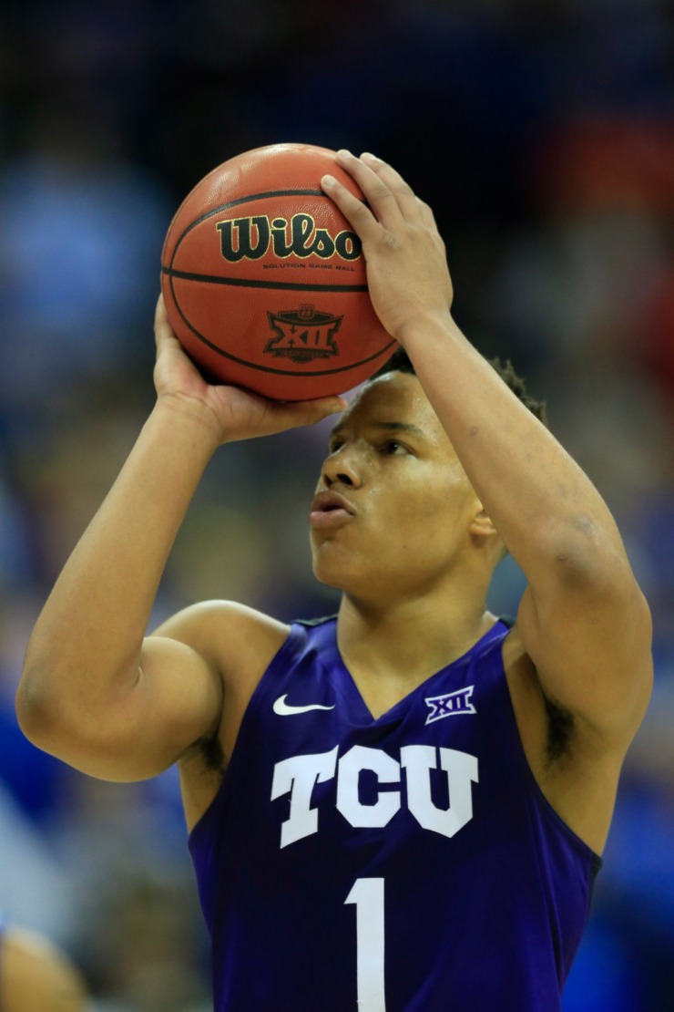 <strong>TCU guard Desmond Bane (1) makes a free-throw during the second half of an NCAA college basketball game against Kansas in the quarterfinal round of the Big 12 tournament in Kansas City, Mo., Thursday, March 9, 2017. TCU defeated Kansas 85-82.</strong> (Orlin Wagner/AP file)