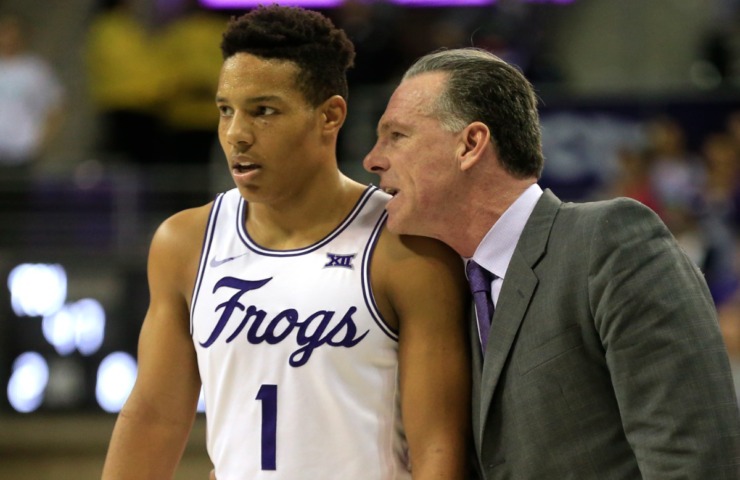<strong>TCU head coach Jamie Dixon talks with TCU guard Desmond Bane (1) as TCU plays West Virginia during the second half of an NCAA college basketball game, Saturday, Feb. 25, 2017, in Fort Worth, Texas.</strong> (Ron Jenkins/AP file)