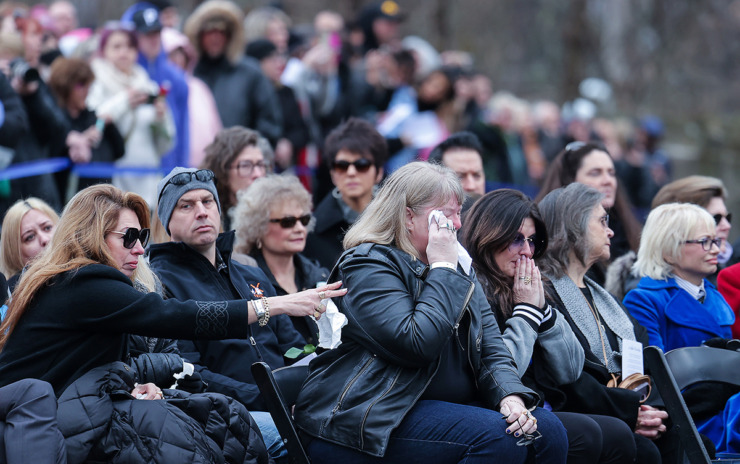 <strong>Mourners comfort each other during a memorial service for Lisa Marie Presley at Graceland in Memphis on Jan. 22.</strong> (Patrick Lantrip/The Daily Memphian)