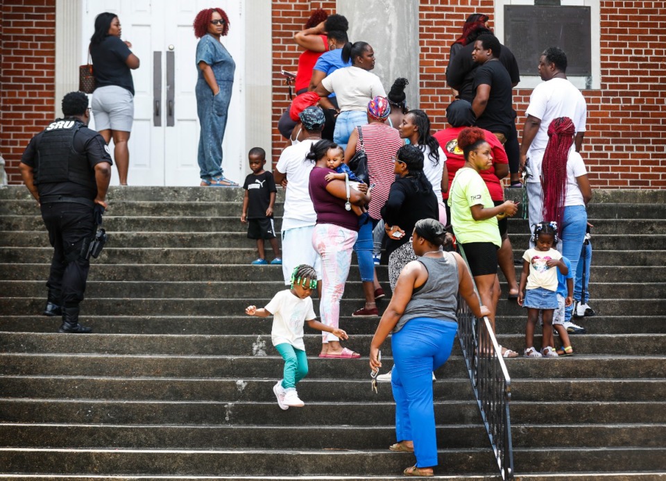 <strong>Parents and family members pick up students from Cummings Elementary School after a roof collapsed on Monday, Aug. 15, 2022, at Metropolitan Baptist Church.</strong> (Mark Weber/The Daily Memphian file)
