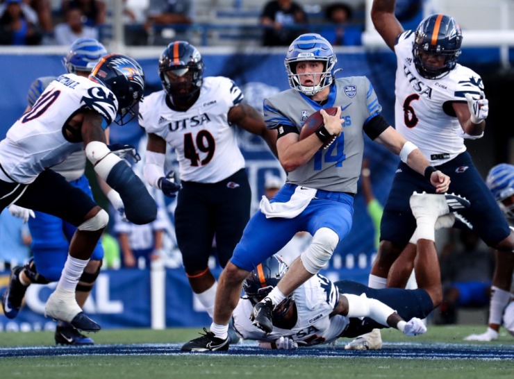 University of Memphis quarterback Seth Henigan (14) scrambles for a first down during a Sept. 25, 2021 game against University of Texas San Antonio at the Liberty Bowl Memorial Stadium in Memphis, Tennessee. (Patrick Lantrip/The Daily Memphian file)