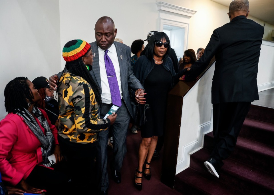 <strong>Attorney Ben Crump (middle) leads RowVaughn Wells, (right) mother of Tyre Nichols, into a press conference on Monday, Jan. 23, 2023. Crump described the video as&nbsp;&ldquo;appalling&rdquo; and &ldquo;heinous.&rdquo;</strong> (Mark Weber/The Daily Memphian file)