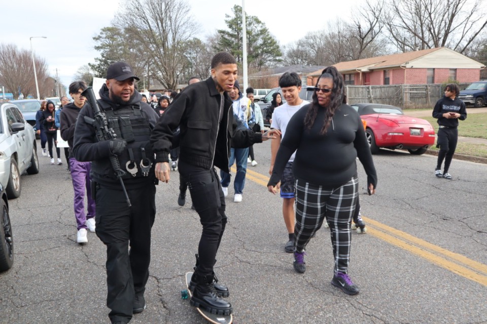 <strong>Rapper NLE Choppa, accompanied by a security guard, makes his way through East Memphis Saturday afternoon, Jan. 28, 2023.</strong> (Rob Moore/The Daily Memphian)