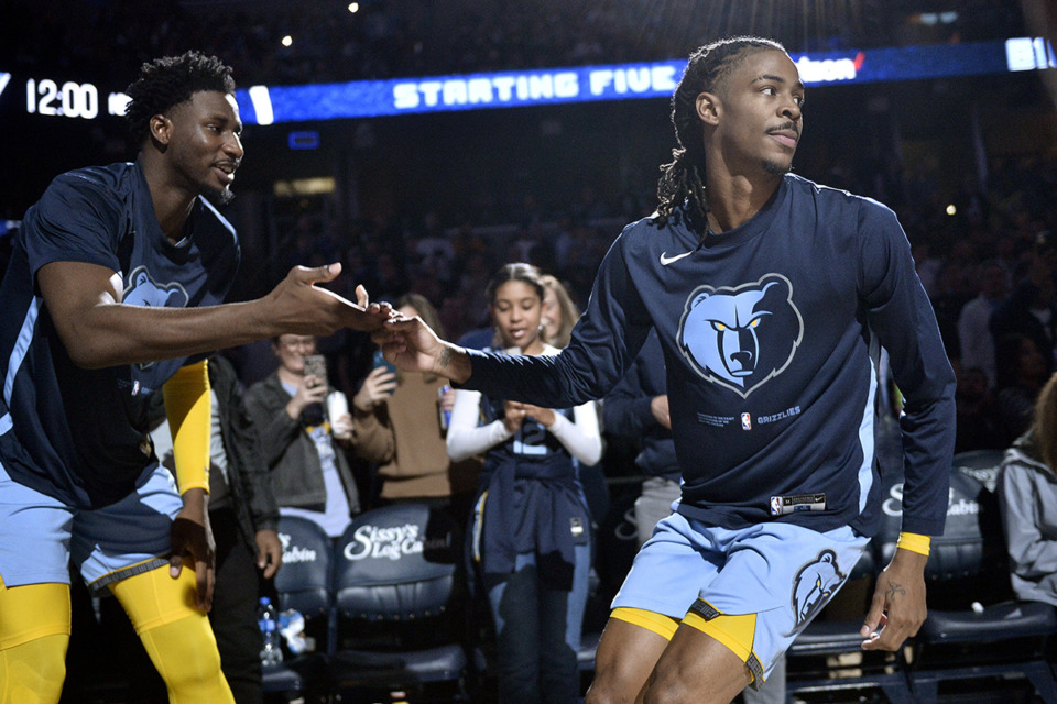 <strong>Memphis Grizzlies guard Ja Morant, right, and forward Jaren Jackson Jr. warm up before an NBA basketball game against the Oklahoma City Thunder on Dec. 7, 2022, in Memphis.</strong> (Brandon Dill/AP Photo)