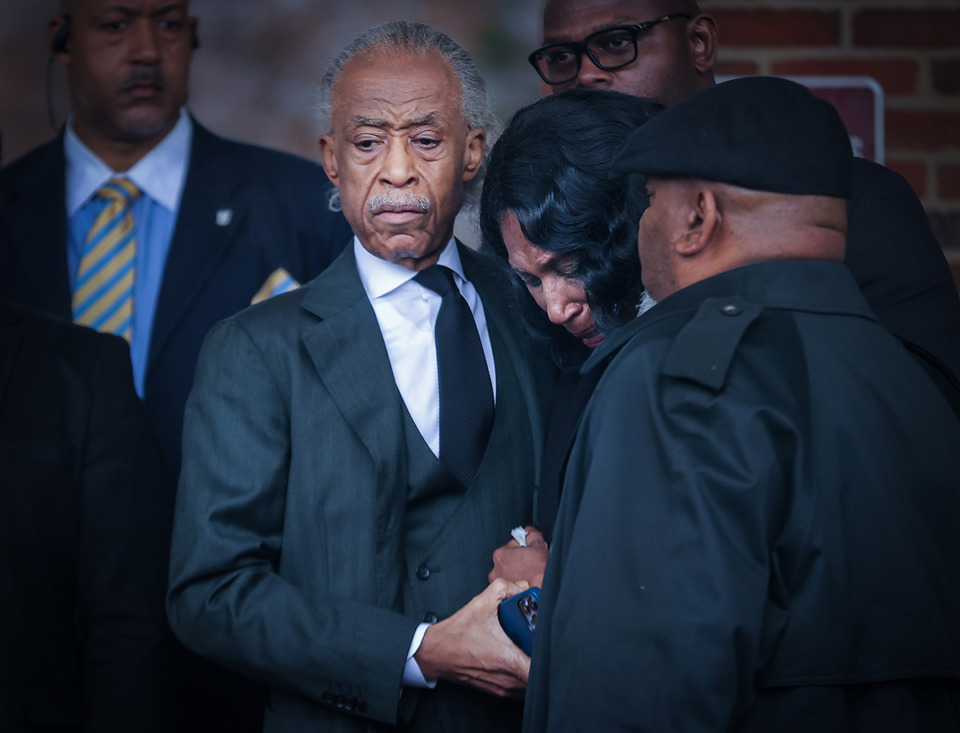 <strong>Rev. Al Sharpton comforts RowVaughn Wells, the mother of Tyre Nichols, while leaving Nichols&rsquo; funeral at Mississippi Boulevard Christian Church on Feb. 1.</strong> (Patrick Lantrip/The Daily Memphian)