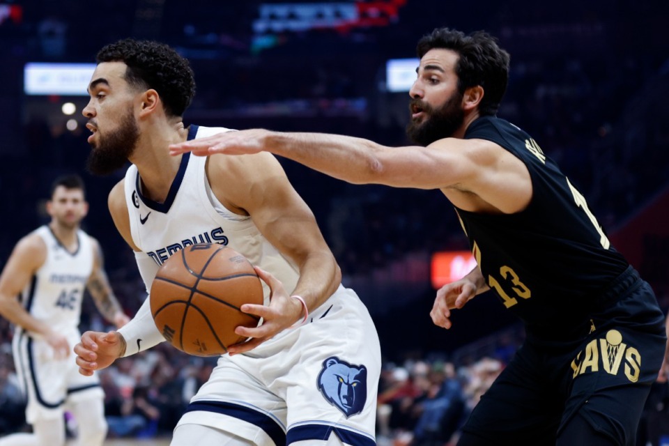 <strong>Memphis Grizzlies guard Tyus Jones drives against Cleveland Cavaliers guard Ricky Rubio (13) on Thursday, Feb. 2, 2023, in Cleveland.</strong> (Ron Schwane/AP)