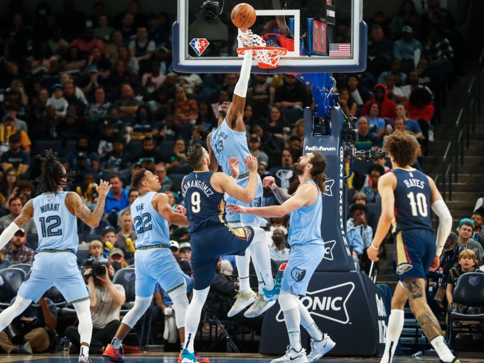 <strong>Ja Morant, Desmond Bane and Steven Adams watch as Memphis Grizzlies defender Jaren Jackson Jr., (top) is called for goaltending against New Orleans Pelicans during action on Saturday, April 9, 2022.</strong> (Mark Weber/The Daily Memphian)
