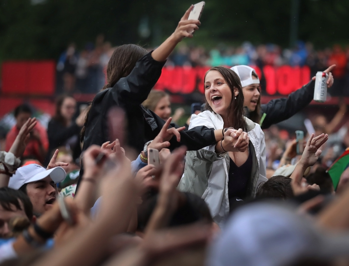 <strong>Miley Cyrus fans sing along to "Party In the USA" during the 2019 Beale Street Music Festival on May 4, 2019, at Tom Lee Park. Despite a persistent drizzle, thousands of fans turned out for performances by Muck Sticky, Echosmith, OneRepublic and Blind Mississippi Morris as well as a surprise visit by Miley Cyrus.</strong> (Jim Weber/Daily Memphian)