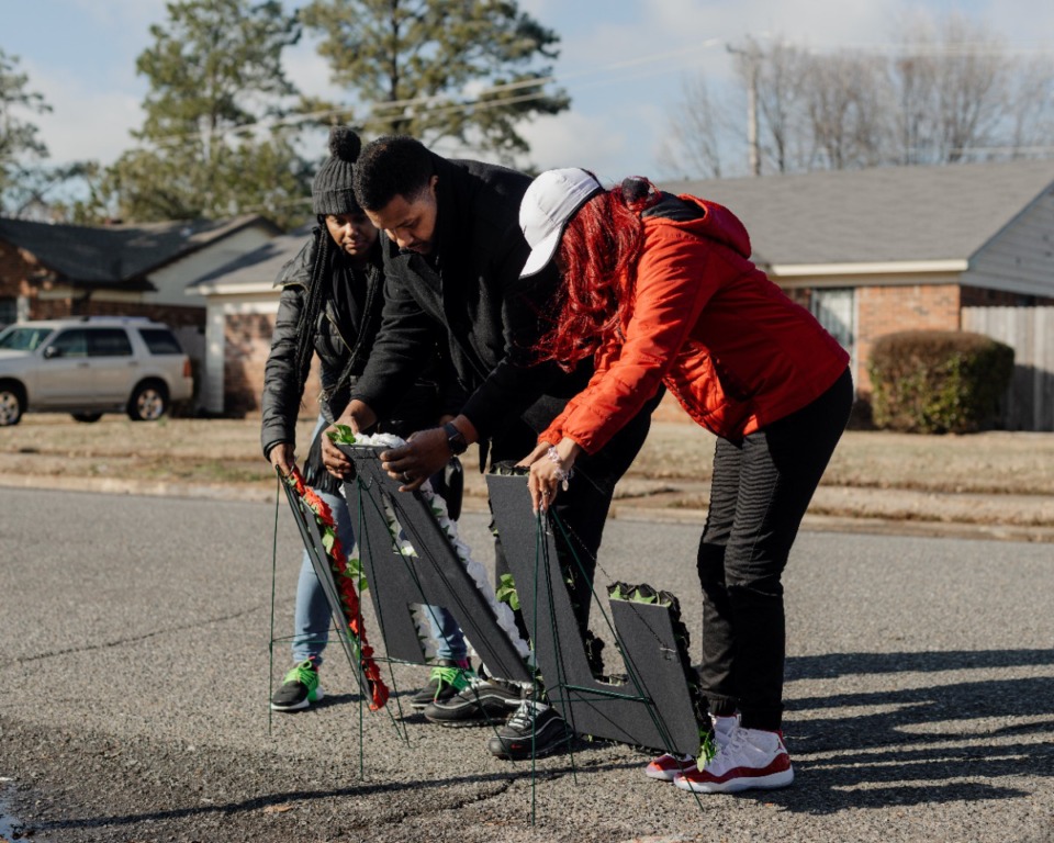 <strong>Ashley McKenzie Smith, right, joined her family on Feb. 3, 2023 to visit the site where her son Jaylin McKenzie was killed by Memphis police officers on Dec. 16, 2022.</strong> (Houston Cofield/Special to The Daily Memphian)