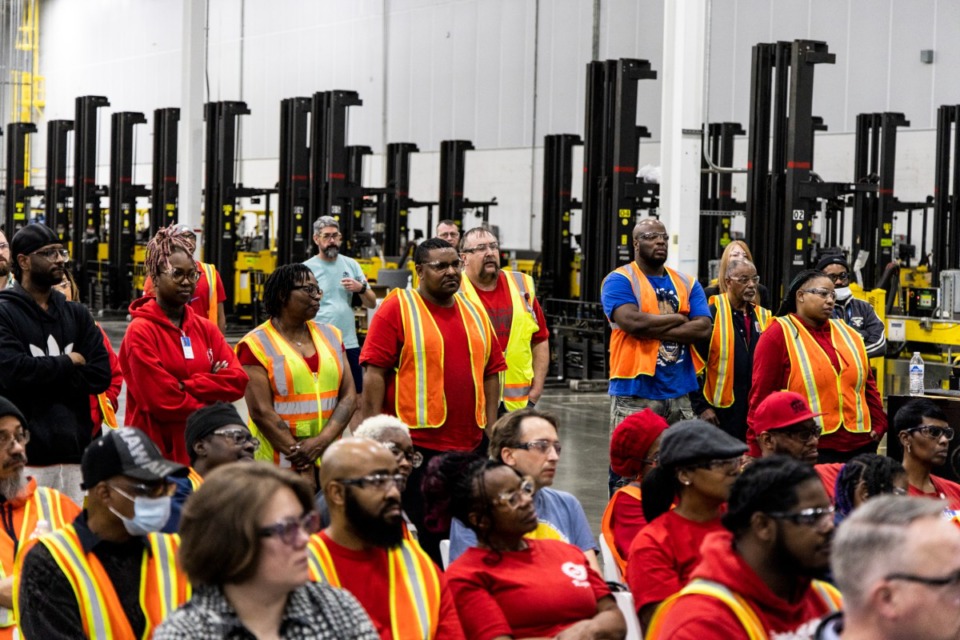 <strong>Employees listen during a Jan. 26 press conference where General Motors made an announcement at the Memphis Parts Distribution Center that will allow for modernizations of the Memphis hub to prepare for vehicle parts growth, including Electric Vehicle parts, as a distributor of ACDelco, EV Chargers, and other support of GM&rsquo;s eCommerce business.</strong> (Brad Vest/Special to The Daily Memphian)