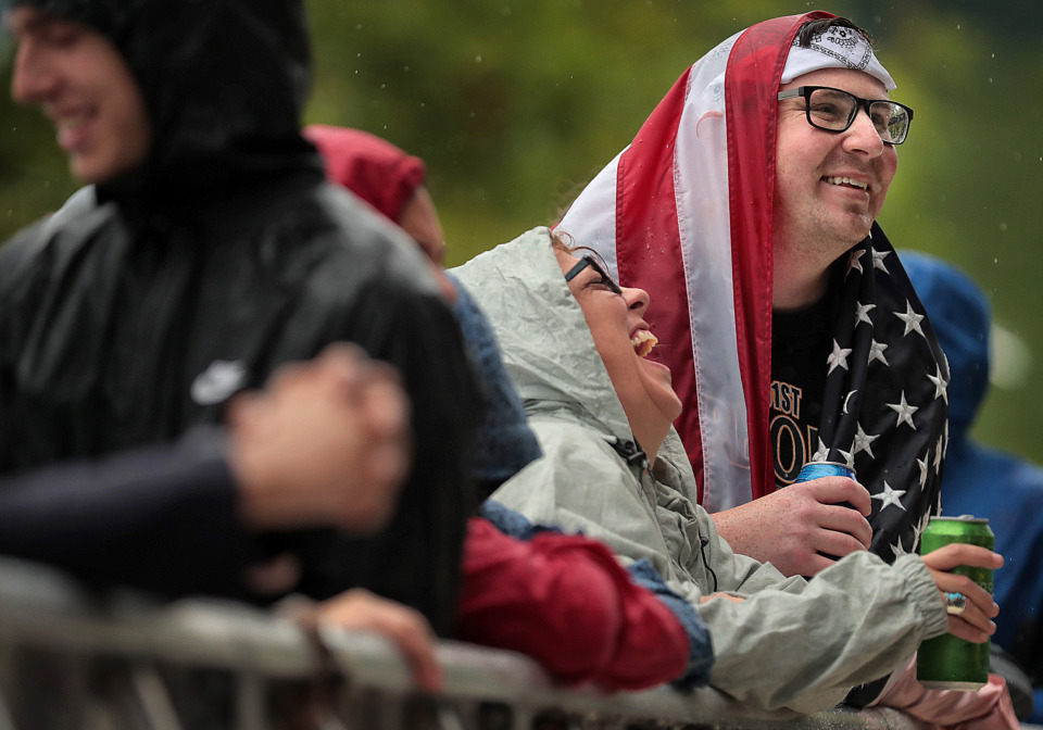 <strong>Fans use a variety of strategies to keep the rain off during the 2019 Beale Street Music Festival on May 4, 2019, at Tom Lee Park. Despite a persistent drizzle, thousands of fans turned out for performances by Muck Sticky, Echosmith, OneRepublic and Blind Mississippi Morris as well as a surprise visit by Miley Cyrus.</strong> (Jim Weber/Daily Memphian)