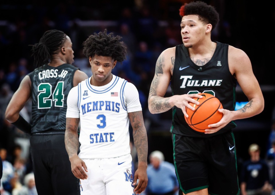 <strong>Dejected Tigers guard Kendric Davis (middle) reacts during a loss to Tulane during action on Saturday, Feb. 4, 2023.</strong> (Mark Weber/The Daily Memphian)