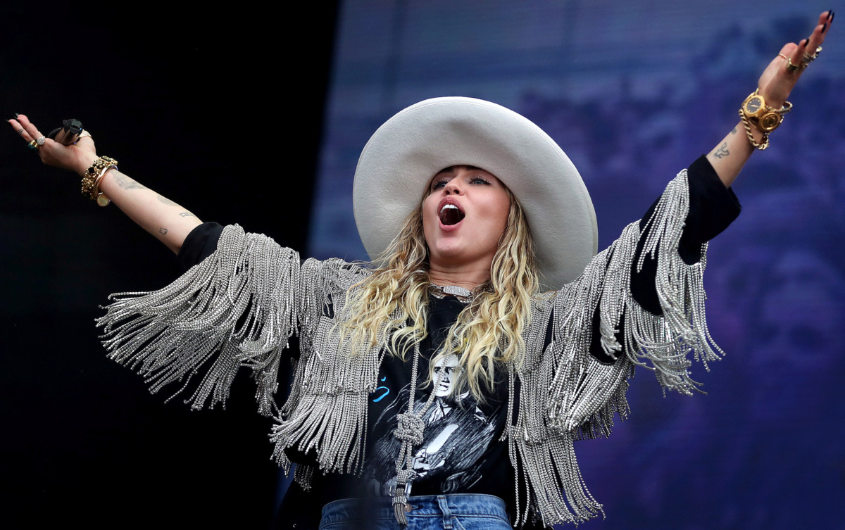 <strong>Pop star Miley Cyrus makes a surprise appearance at the Beale Street Music Festival on May 4, 2019, performing several of her hits as well as a duet with Grammy-winning singer-songwriter Marc Cohn on the Terminix Stage at Tom Lee Park.</strong> (Jim Weber/Daily Memphian)