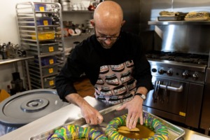 <strong>Father Ben Bradshaw, the priest at St. Michael's Catholic Church, will make hundreds of king cakes for Mardi Gras again this year.</strong>&nbsp;(Brad Vest/ Special to The Daily Memphian)