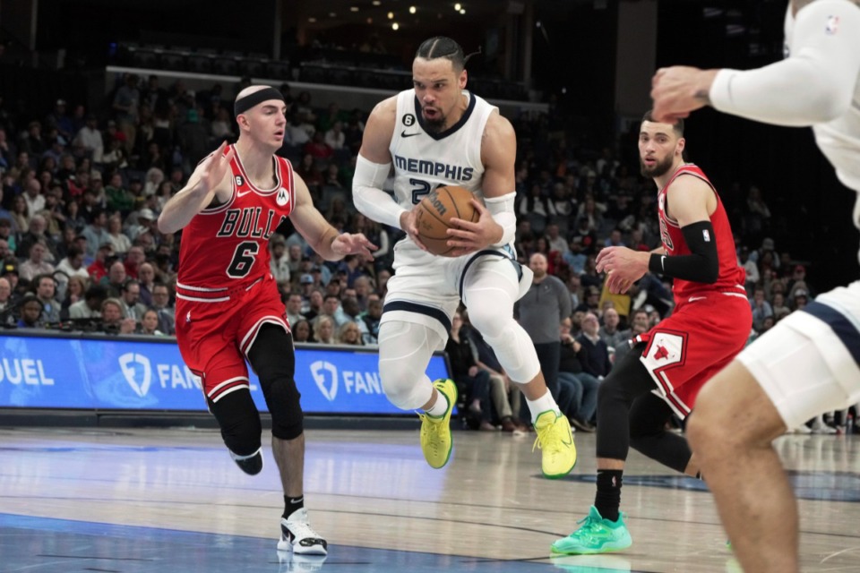<strong>Memphis Grizzlies guard Dillon Brooks (24) heads for the basket as Chicago Bulls Alex Caruso (6) defends during the first half of an NBA basketball game on Feb. 7, 2023.</strong> (Karen Pulfer Focht/AP)